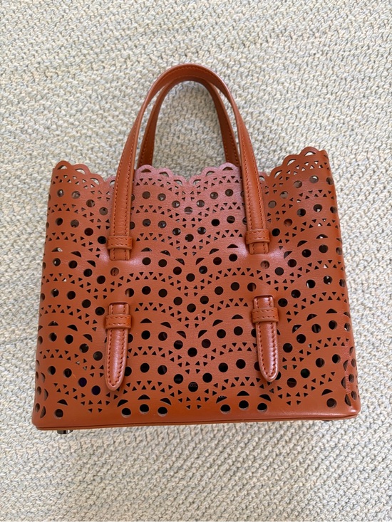 Alaia Handbags - Alaïa Perforated Leather Tote in Cognac Brown